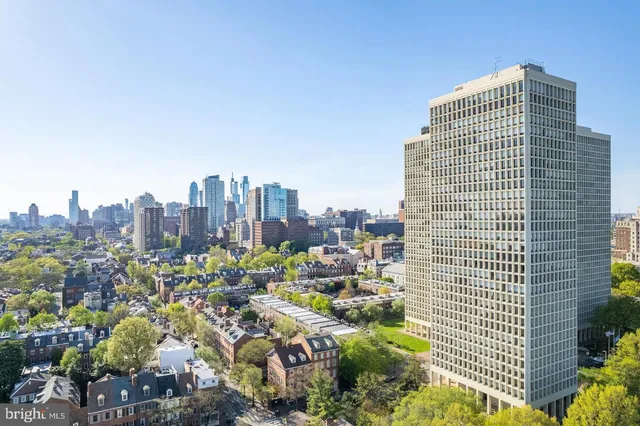 a view of a city with tall buildings