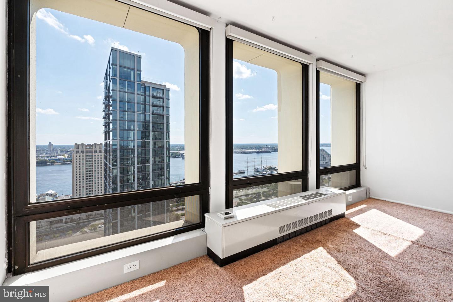 200 Locust Street, Unit 27FN Philadelphia, PA 19106 - Photo 9 of 48 a living room with couch