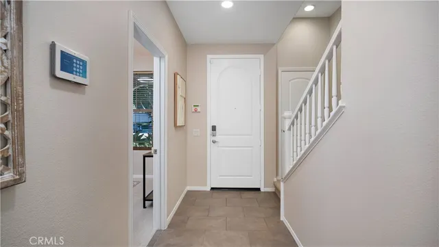 a view of a hallway with staircase