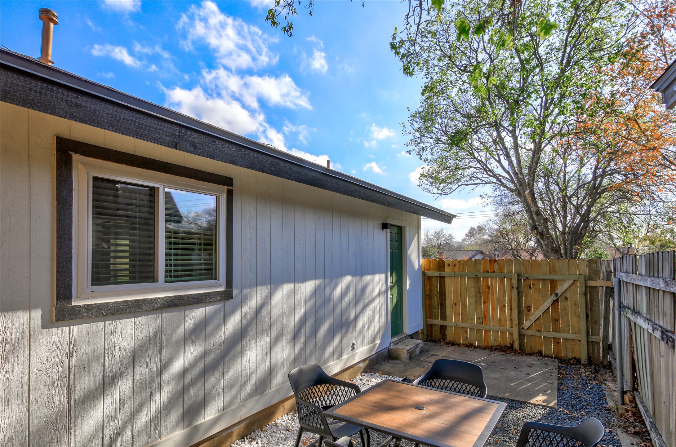 10509 Macmora Road, Unit B Austin, TX 78758 - Photo 16 of 19 a view of backyard with deck