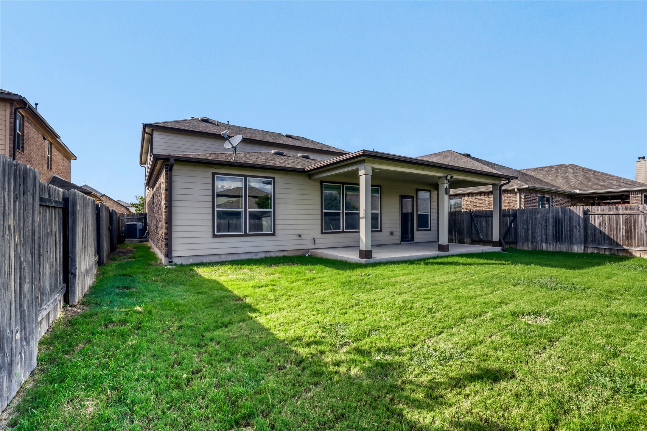 104 Kavanaugh Street Georgetown, TX 78628 - Photo 16 of 30 Back of the home with nice covered patio