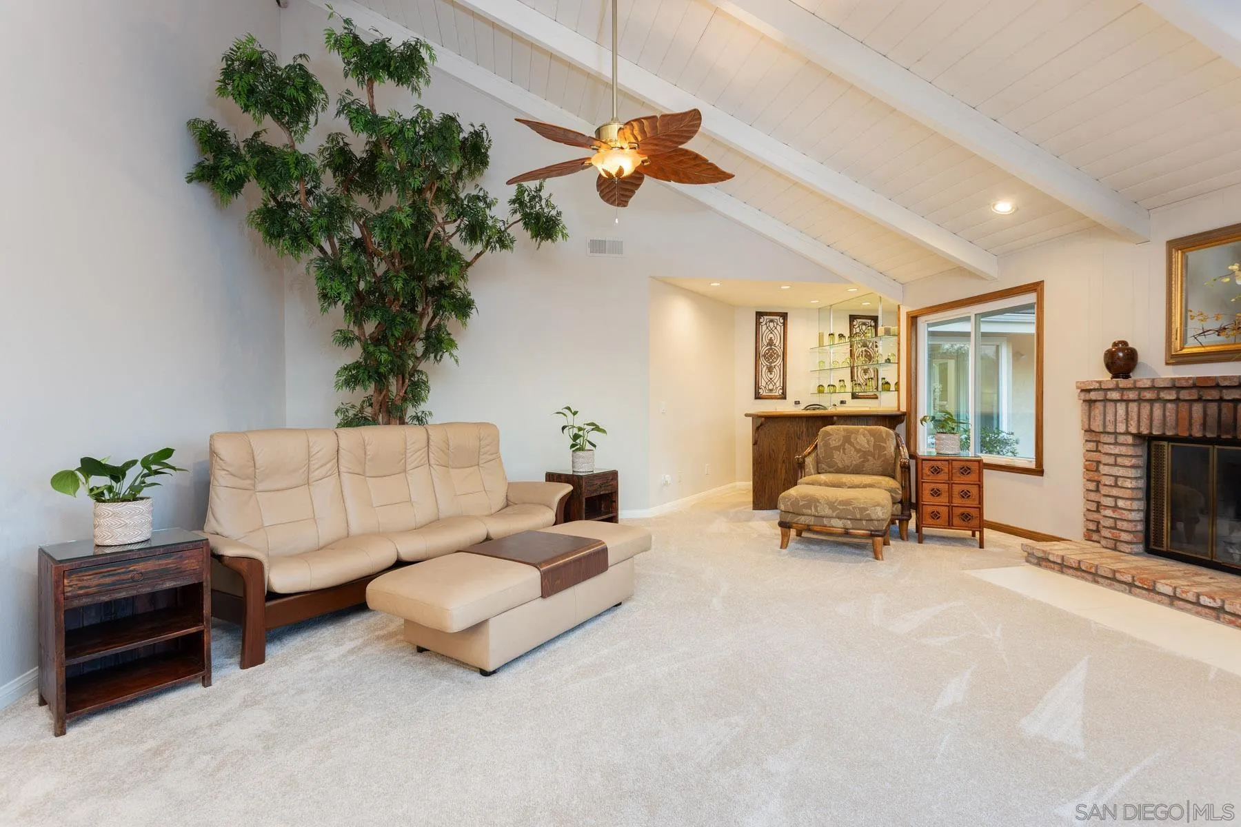 1735 Kings Road Vista, CA 92084 - Photo 7 of 32 a living room with furniture and a potted plant