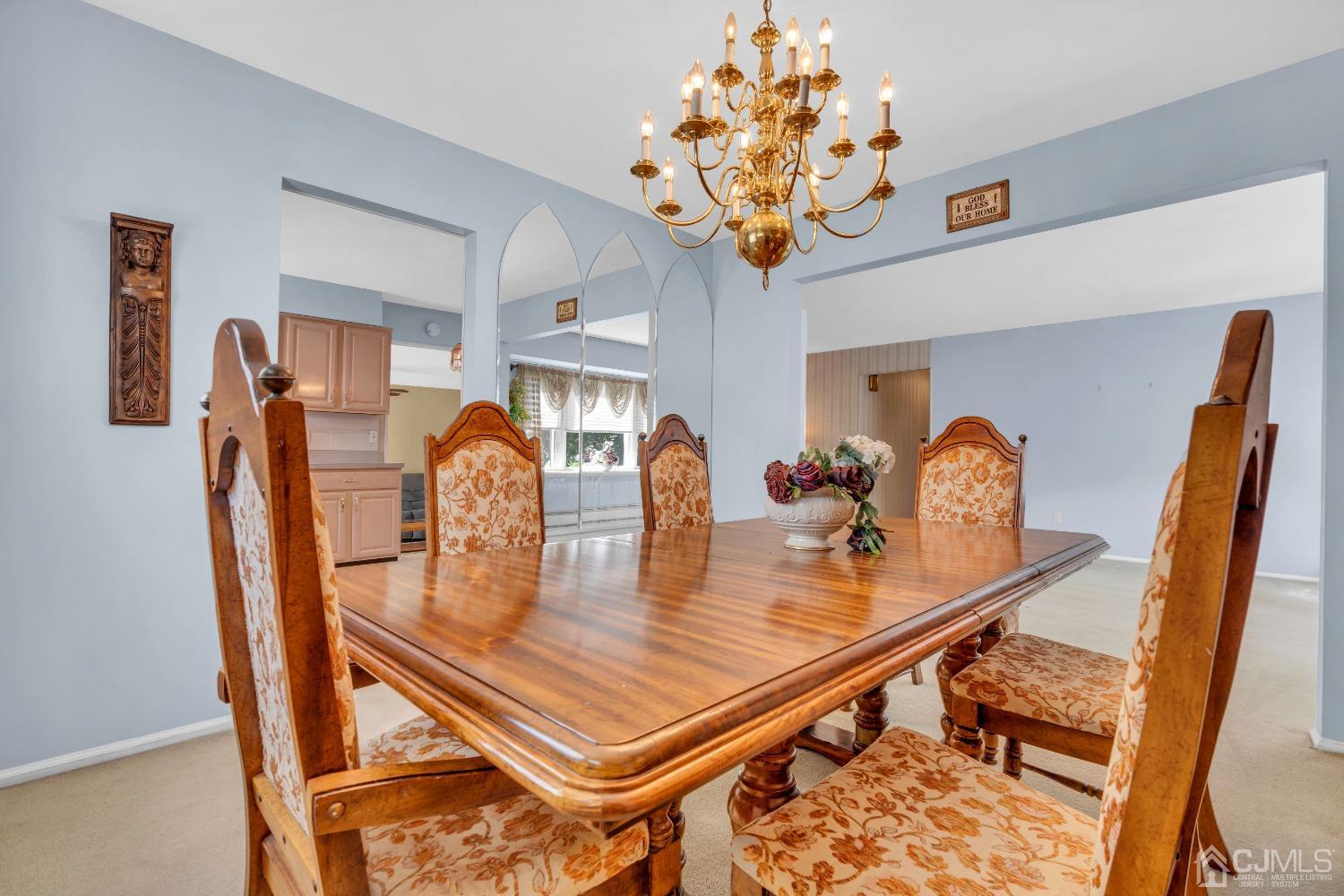 1 Robinhood Drive Sayreville, NJ 08859 - Photo 14 of 29 a dining room with furniture and chandelier
