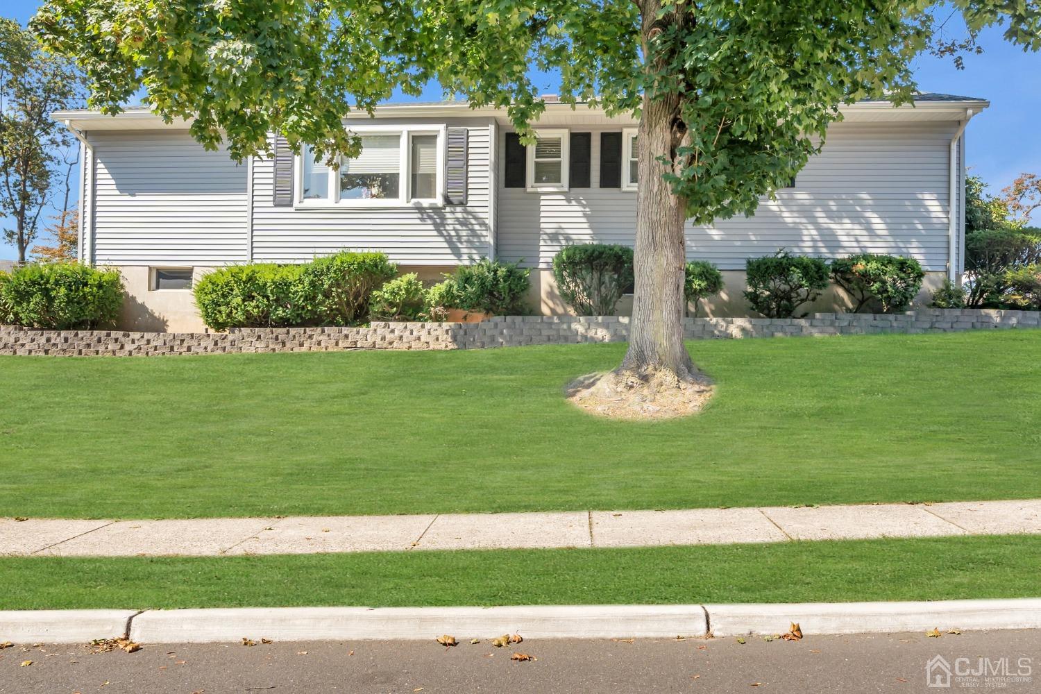 1 Robinhood Drive Sayreville, NJ 08859 - Photo 2 of 29 a view front of house with a yard