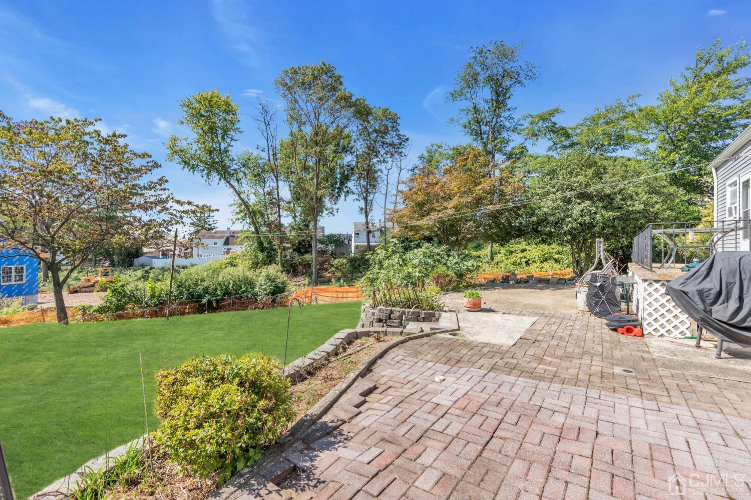 1 Robinhood Drive Sayreville, NJ 08859 - Photo 26 of 29 a view of a backyard with plants and garden