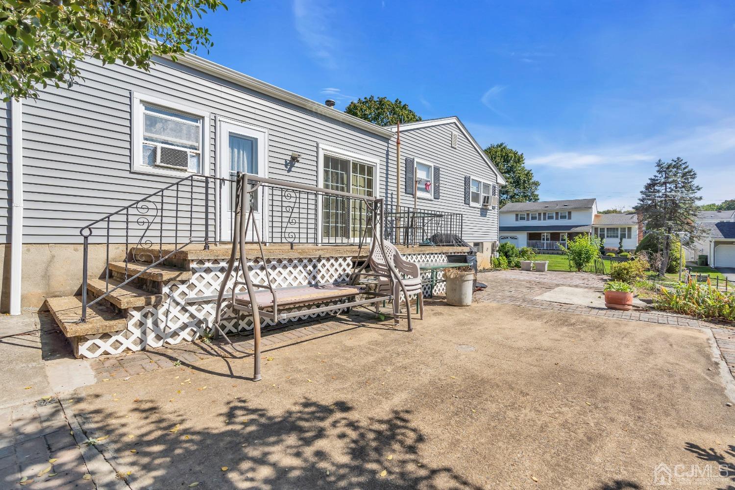 1 Robinhood Drive Sayreville, NJ 08859 - Photo 27 of 29 a view of a house with backyard and sitting area
