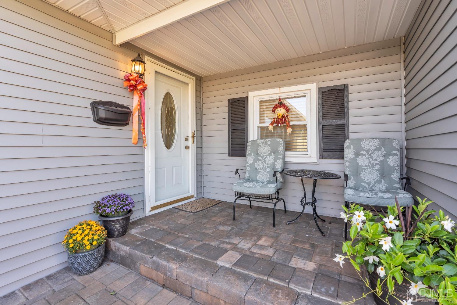 1 Robinhood Drive Sayreville, NJ 08859 - Photo 4 of 29 a front view of a house with patio