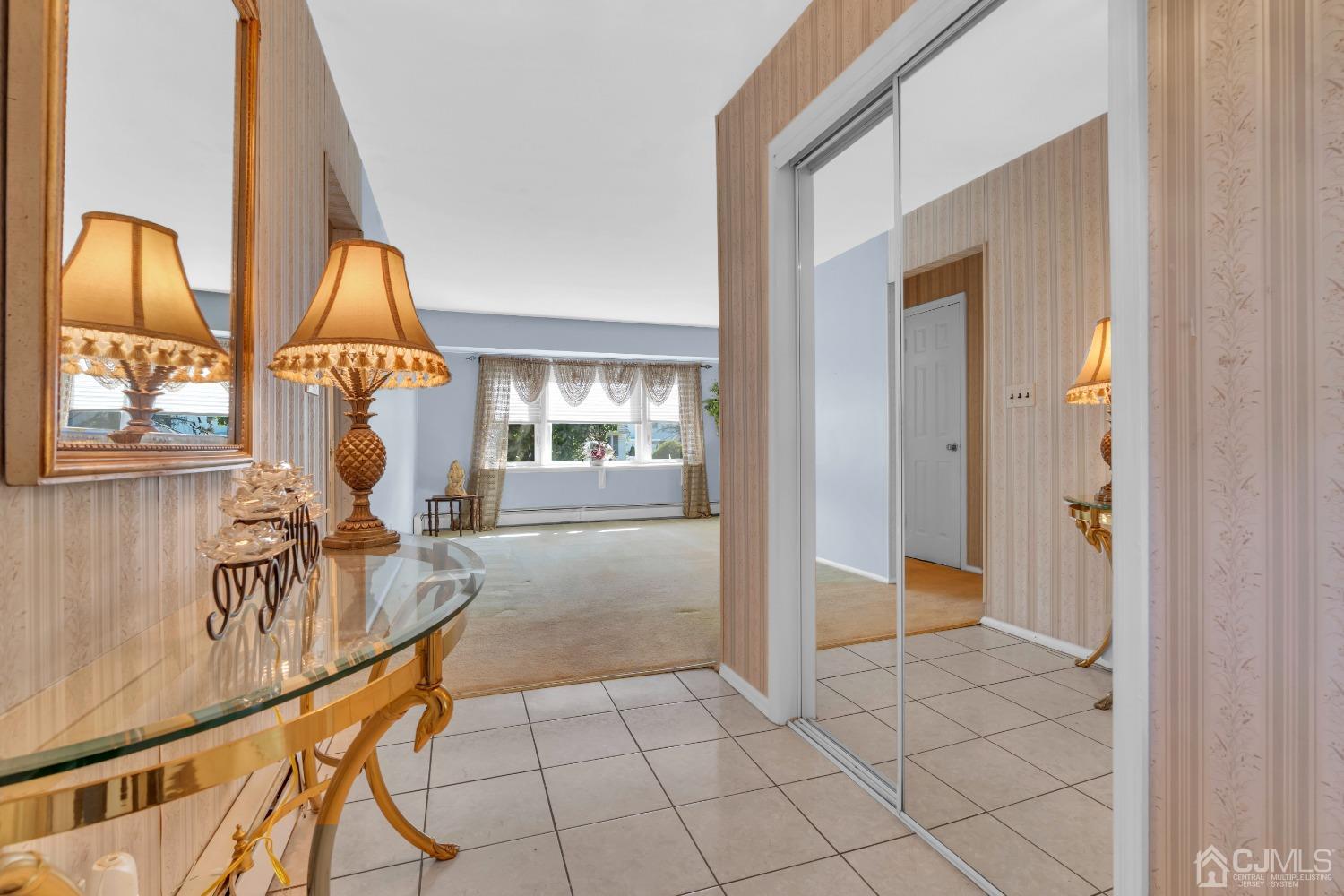 1 Robinhood Drive Sayreville, NJ 08859 - Photo 6 of 29 a view of an entryway with wooden floor and door