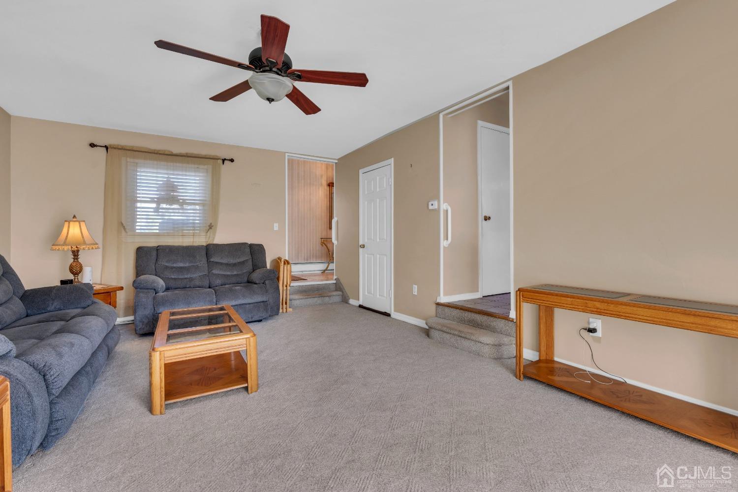 1 Robinhood Drive Sayreville, NJ 08859 - Photo 8 of 29 a bedroom with furniture and a ceiling fan