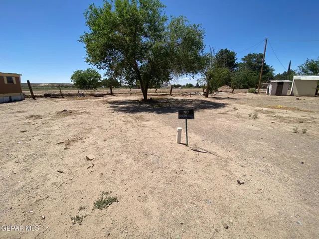 a view of backyard of a house