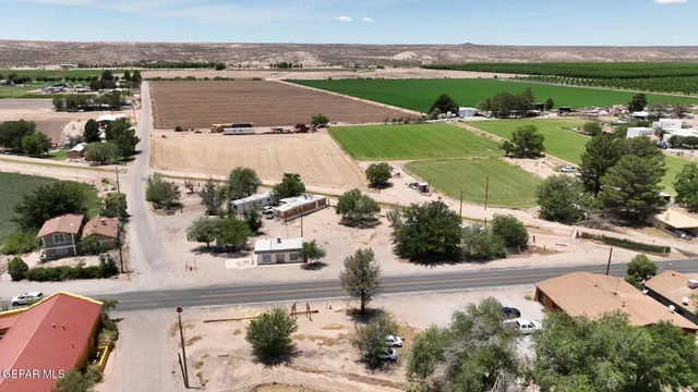 an aerial view of a house with a garden