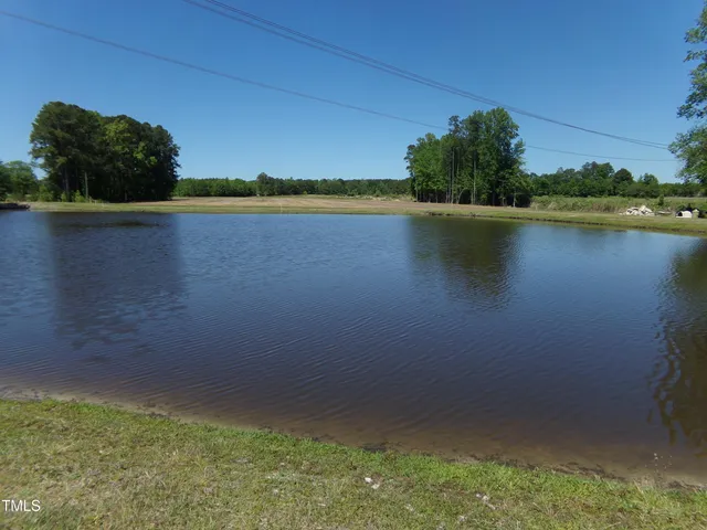 a view of lake background and a yard