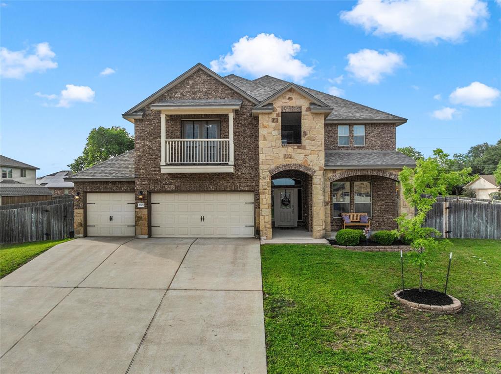 5801 Beckon Waco, TX 76708 - Photo 1 of 37 a front view of a house with a yard