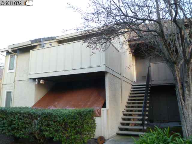 a house with trees in front of it