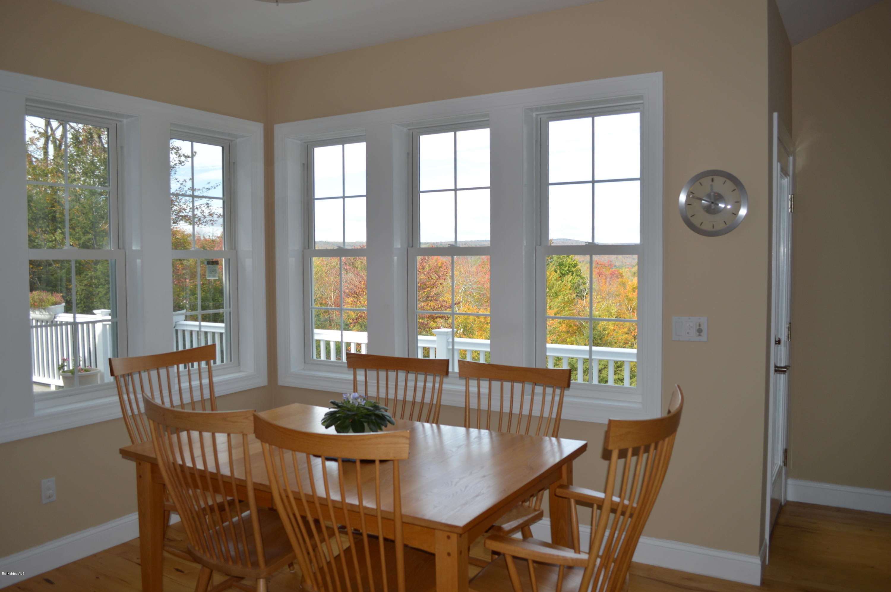 155 Valley View Road Becket, MA 01223 - Photo 14 of 56 a view of a dining room with furniture and window