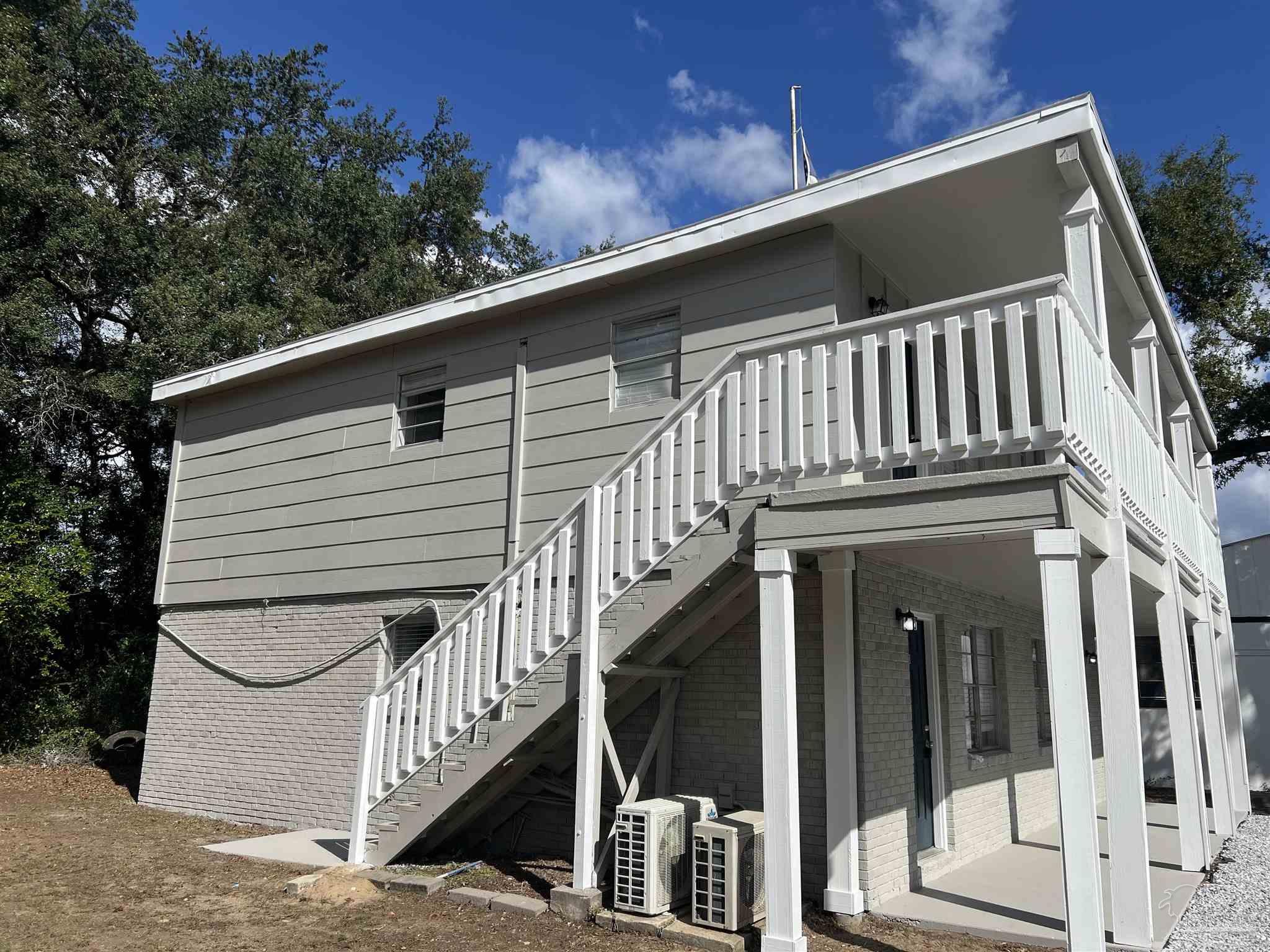 6642 Applegate Street Milton, FL 32570 - Photo 2 of 10 a view of balcony