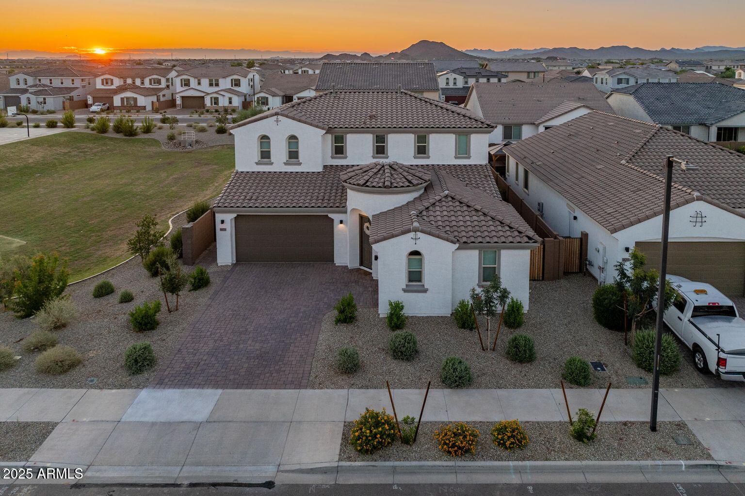 14274 West Sand Hills Road Surprise, AZ 85387 - Photo 2 of 24 an aerial view of a house