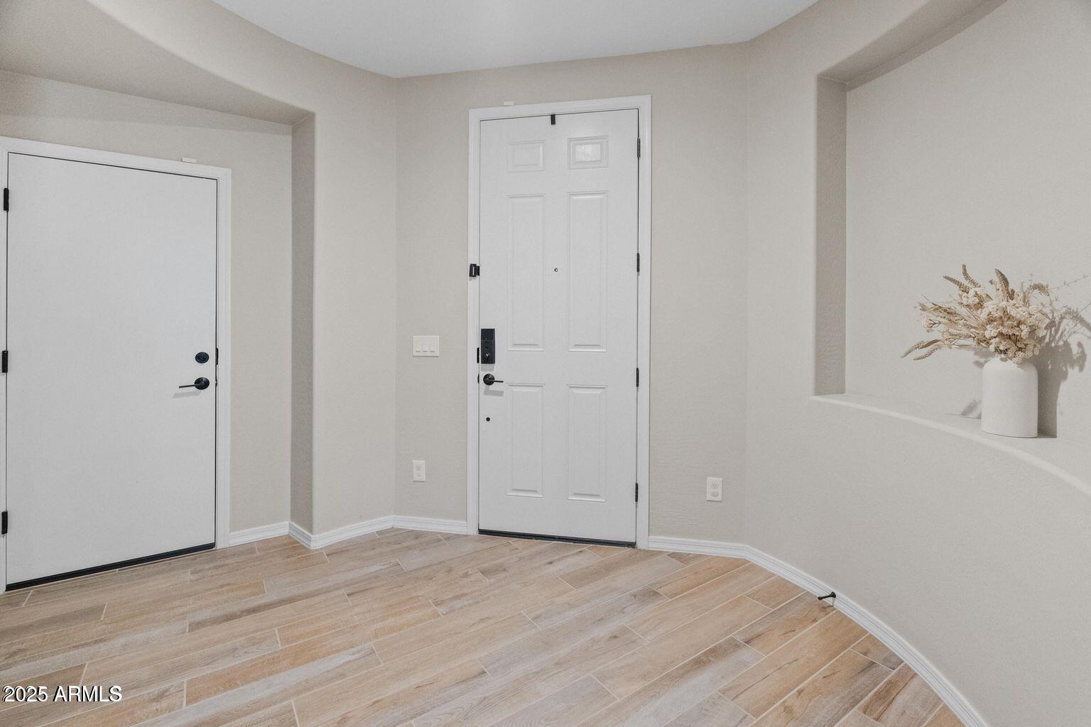 14274 West Sand Hills Road Surprise, AZ 85387 - Photo 6 of 24 a view of an empty room