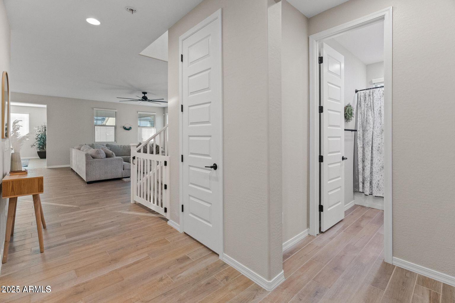 14274 West Sand Hills Road Surprise, AZ 85387 - Photo 8 of 24 a view of a livingroom with furniture and hardwood floor