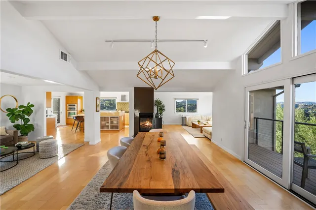a view of a living room and dining room