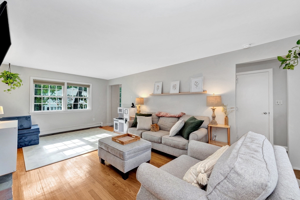 14 Hanson Street Dedham, MA 02026 - Photo 24 of 41 a living room with furniture and a window