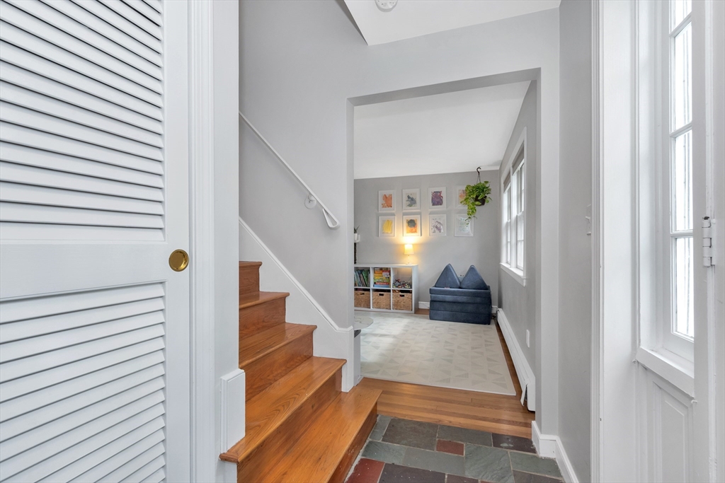 14 Hanson Street Dedham, MA 02026 - Photo 29 of 41 a view of entryway and hall with wooden floor