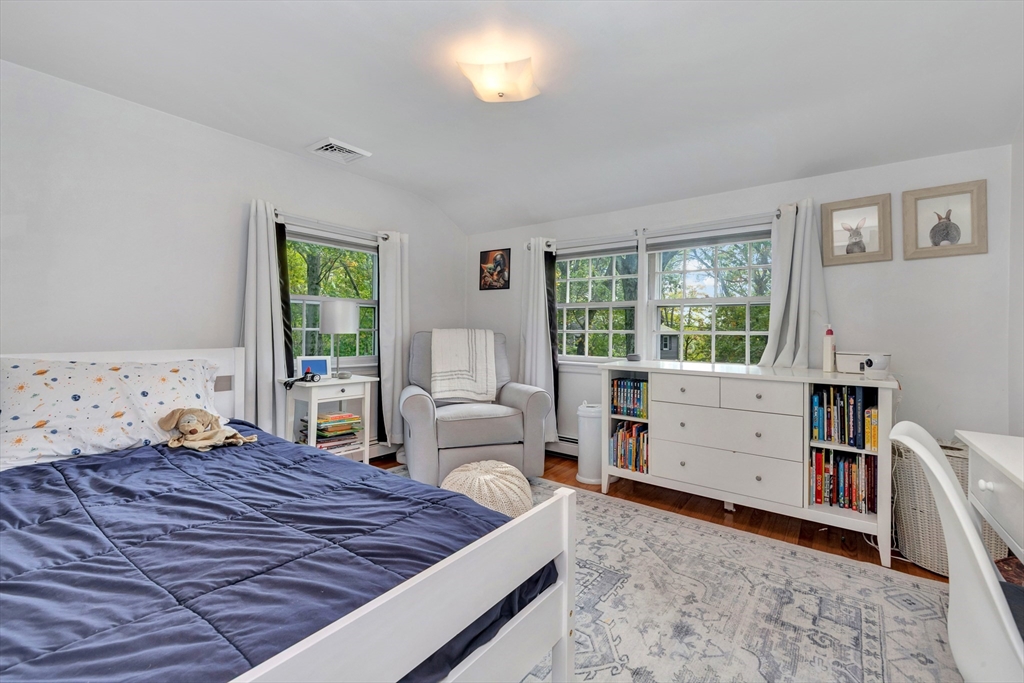 14 Hanson Street Dedham, MA 02026 - Photo 33 of 41 a bed room with a bed and a window