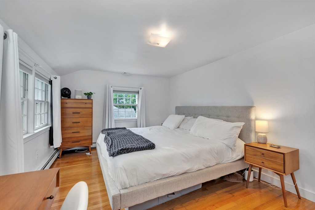 14 Hanson Street Dedham, MA 02026 - Photo 38 of 41 a bedroom with a bed and furniture