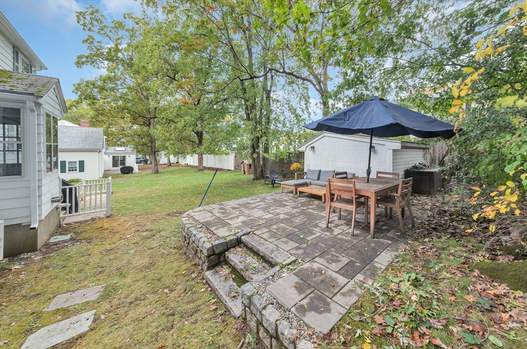 14 Hanson Street Dedham, MA 02026 - Photo 7 of 41 a view of a house with backyard and sitting area