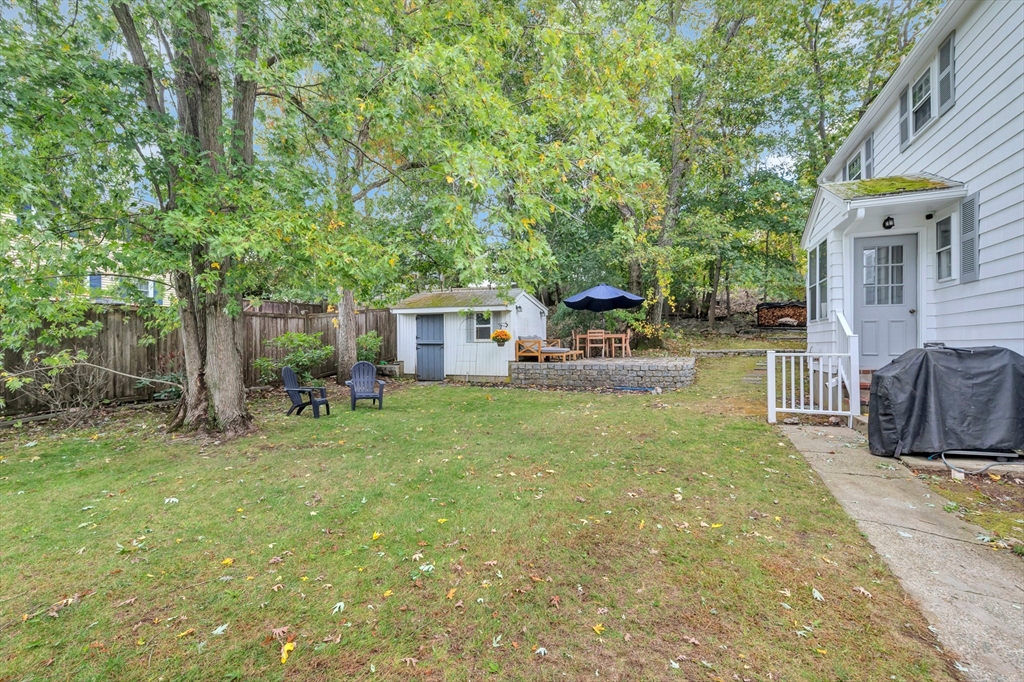 14 Hanson Street Dedham, MA 02026 - Photo 9 of 41 a view of a house with backyard and sitting area