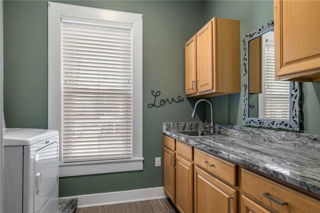 407 Hulton Road Oakmont, PA 15139 - Photo 25 of 50 Upstairs laundry room! So rare! There also is cabinetry and a counter for folding clothese
