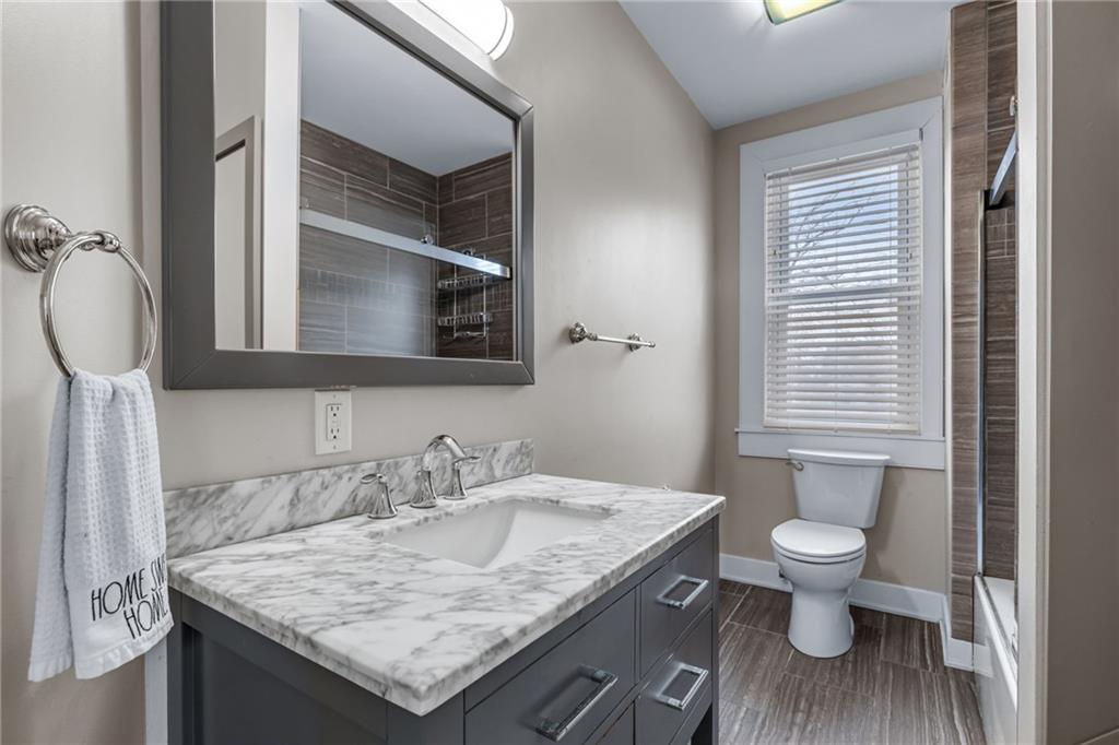 407 Hulton Road Oakmont, PA 15139 - Photo 27 of 50 The hallway full bath had a tiled tub/shower surround and a modern vanity