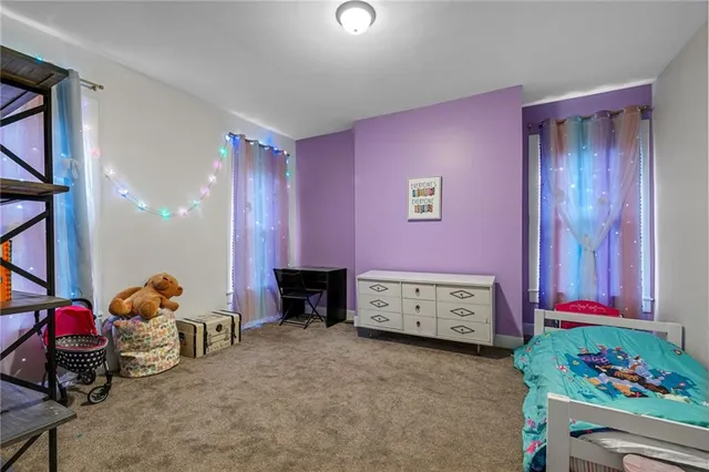 a room with furniture and toys