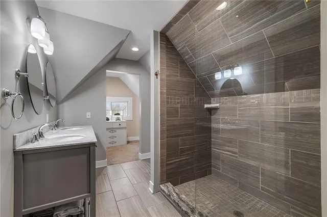 a bathroom with a sink and mirror