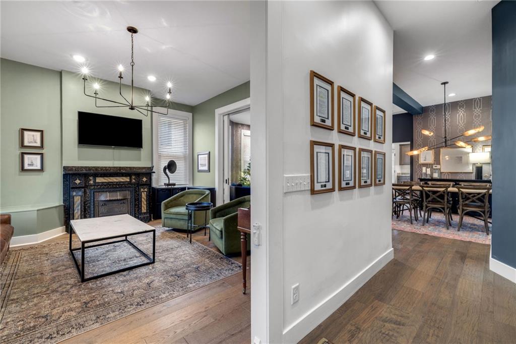 407 Hulton Road Oakmont, PA 15139 - Photo 4 of 50 The living room is off the entry and features so many original details such as pocket doors, stained glass, and a stunning fireplace mantel (decorative)