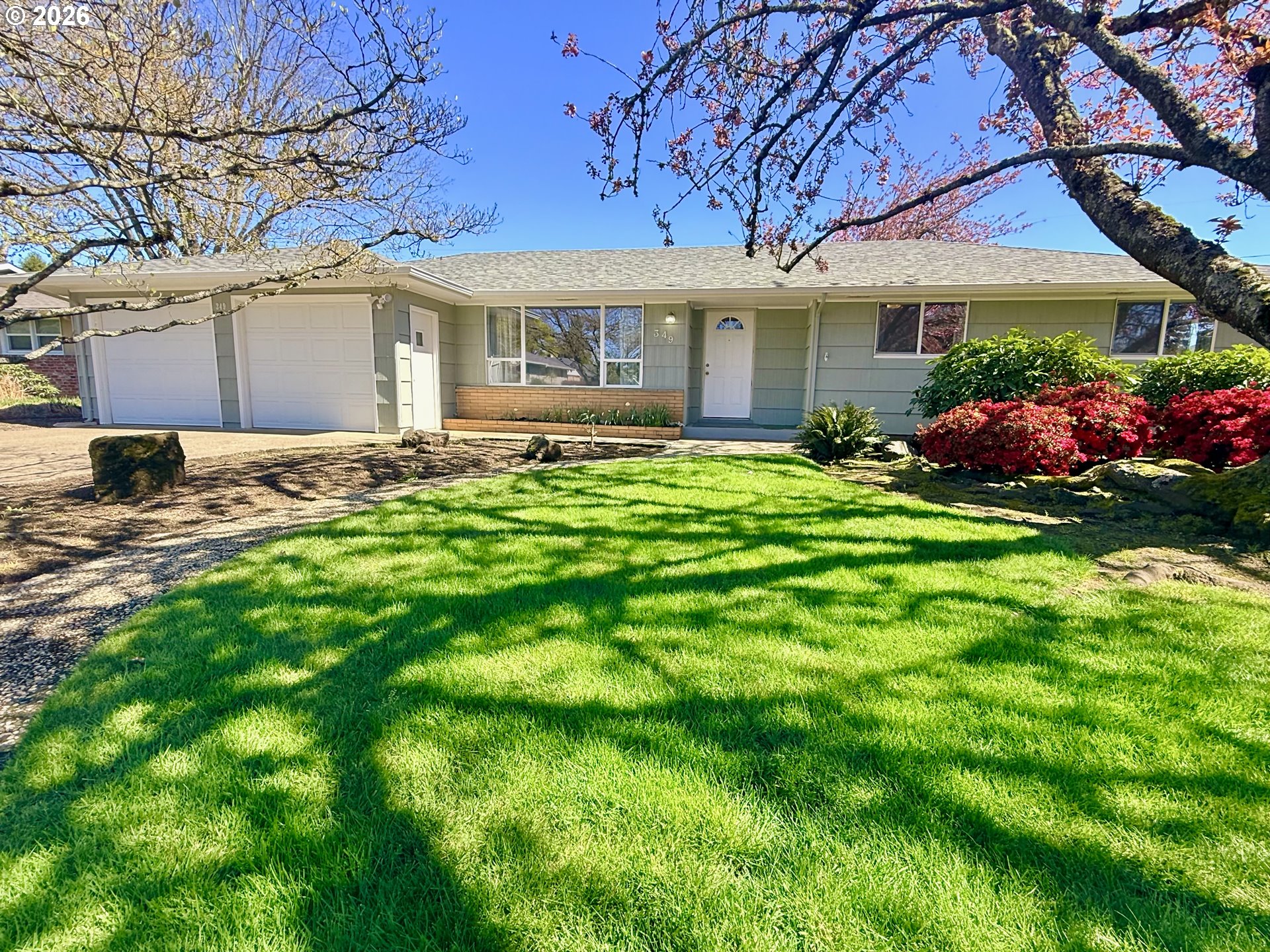 349 Van Duyn Street Eugene, OR 97401 - Photo 1 of 24 a front view of a house with a garden