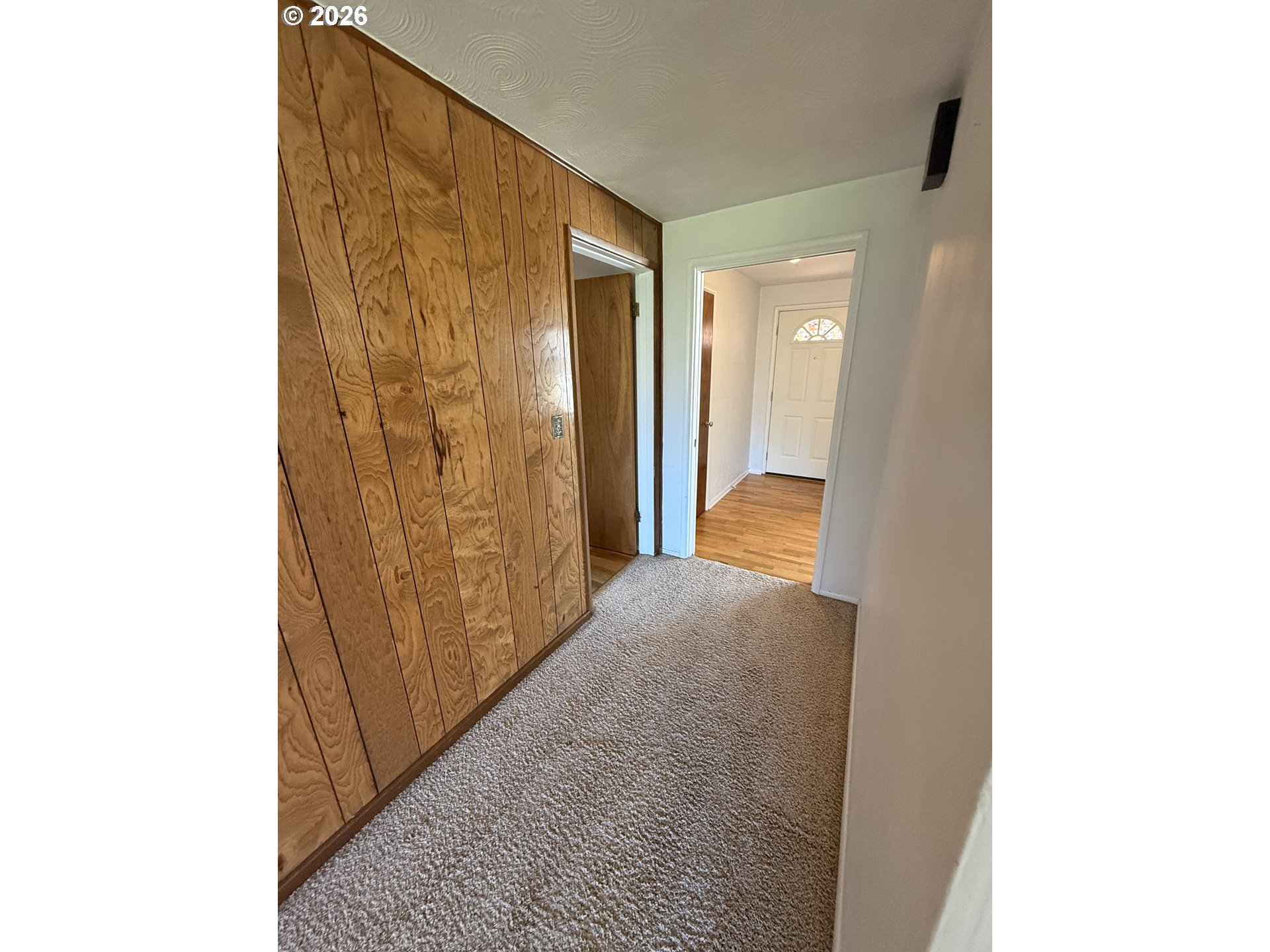 349 Van Duyn Street Eugene, OR 97401 - Photo 3 of 24 a view of a hallway with wooden shelves
