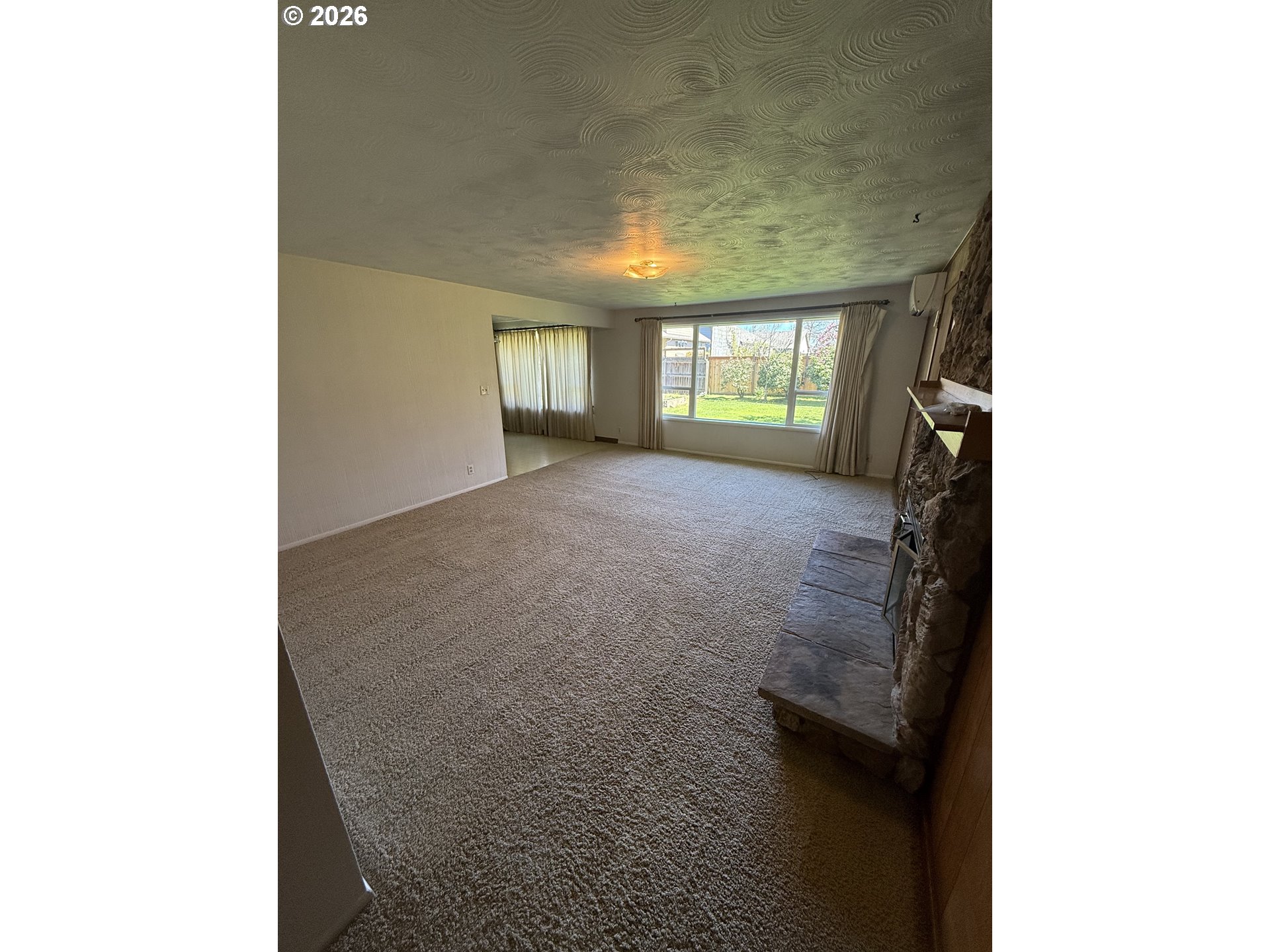 349 Van Duyn Street Eugene, OR 97401 - Photo 4 of 24 a view of a room that has a window