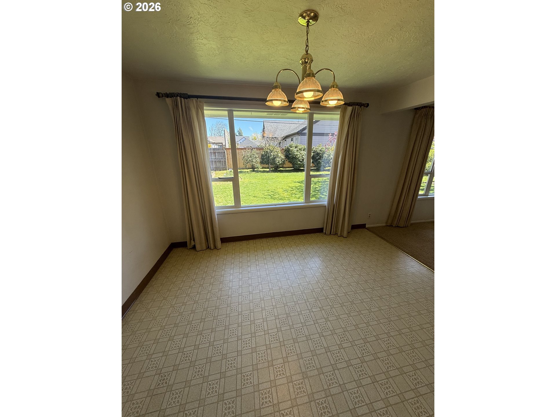 349 Van Duyn Street Eugene, OR 97401 - Photo 7 of 24 a view of a room with window and front door