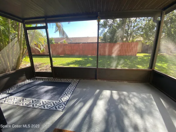 a view of a pathway with a park