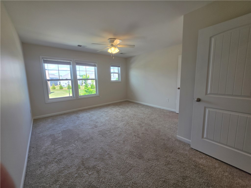 312 Phillips Drive Pendleton, SC 29670 - Photo 28 of 45 This is the first bedroom as you come upstairs it is the largest and has 3 windows. This bedroom is located in the front of the home.