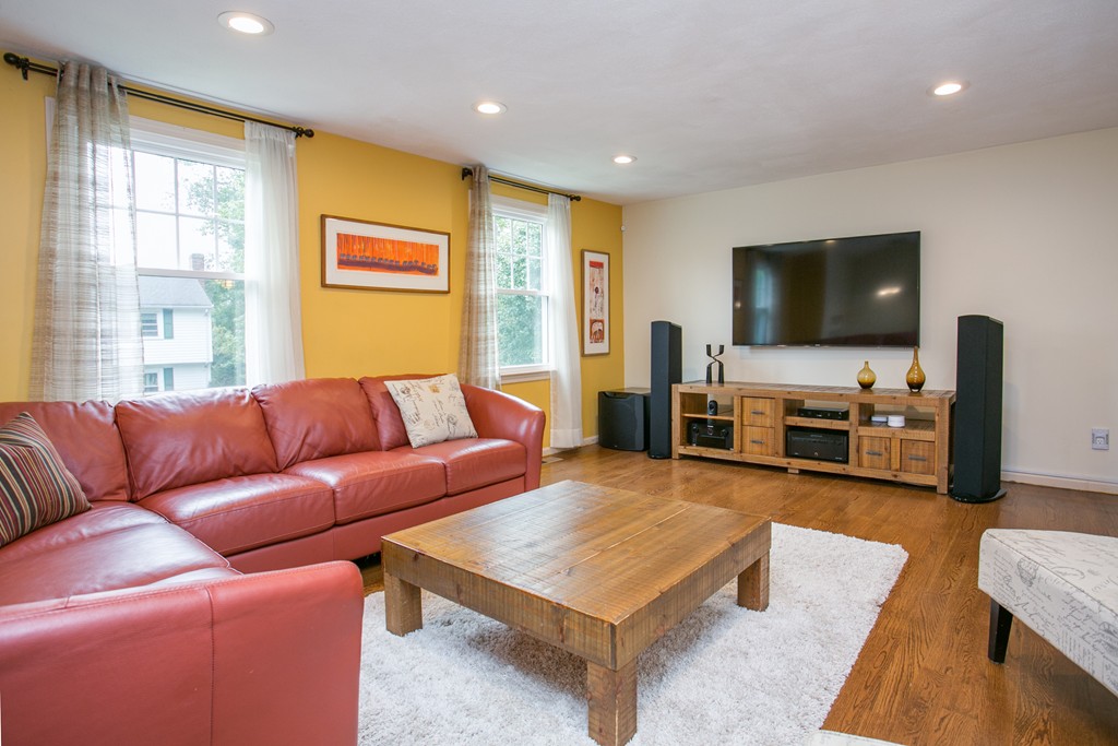 37 Valley Road Needham, MA 02492 - Photo 3 of 19 a living room with furniture and a flat screen tv