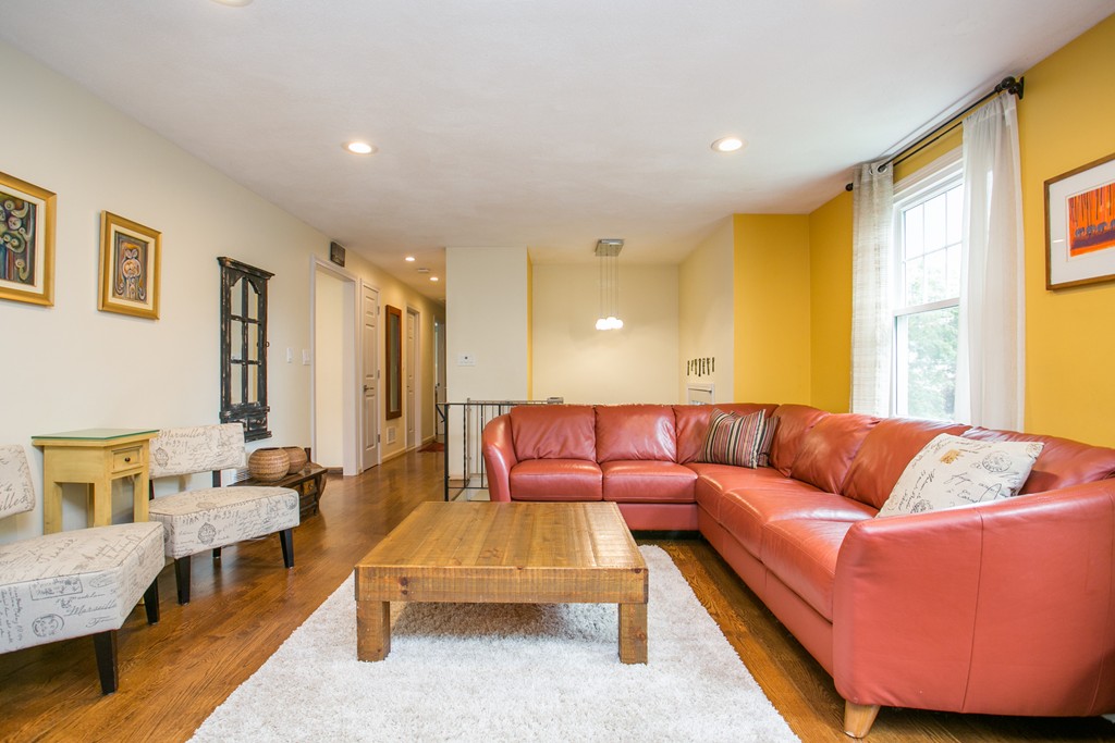 37 Valley Road Needham, MA 02492 - Photo 4 of 19 a living room with furniture and a couch