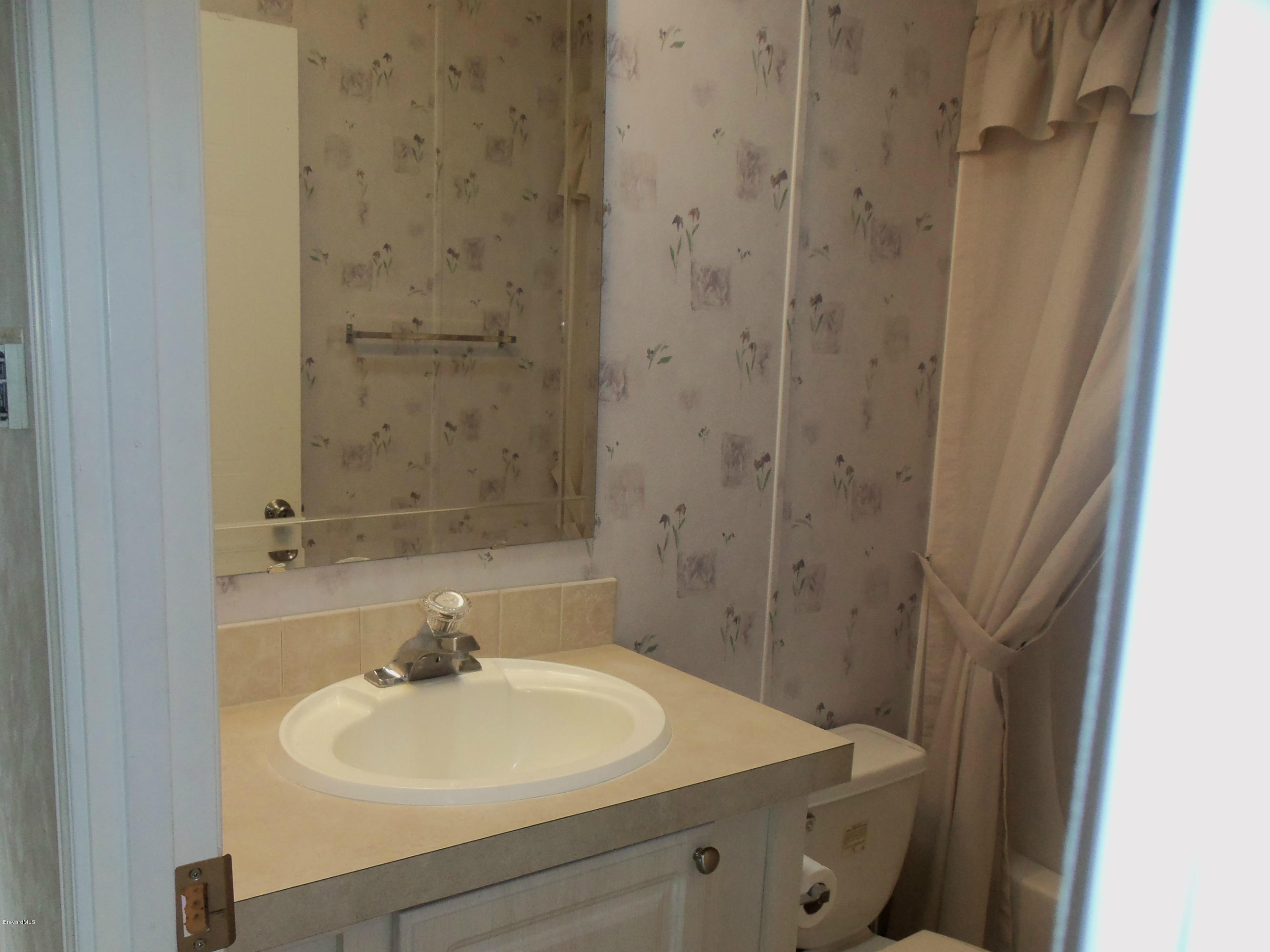 7544 Chasta Road, Unit JI8 Micco, FL 32976 - Photo 22 of 27 100_0742