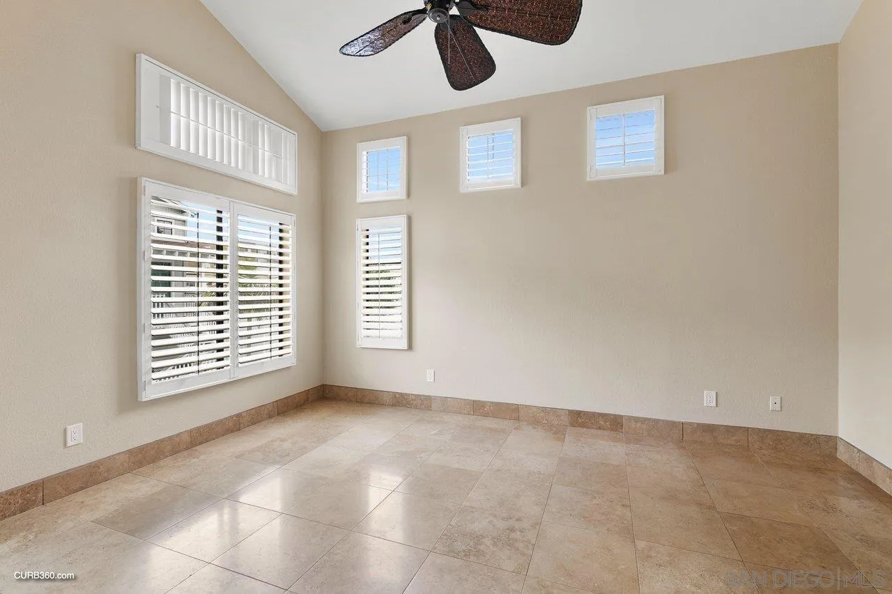 4579 54th Street San Diego, CA 92115 - Photo 20 of 39 a view of an empty room with a window