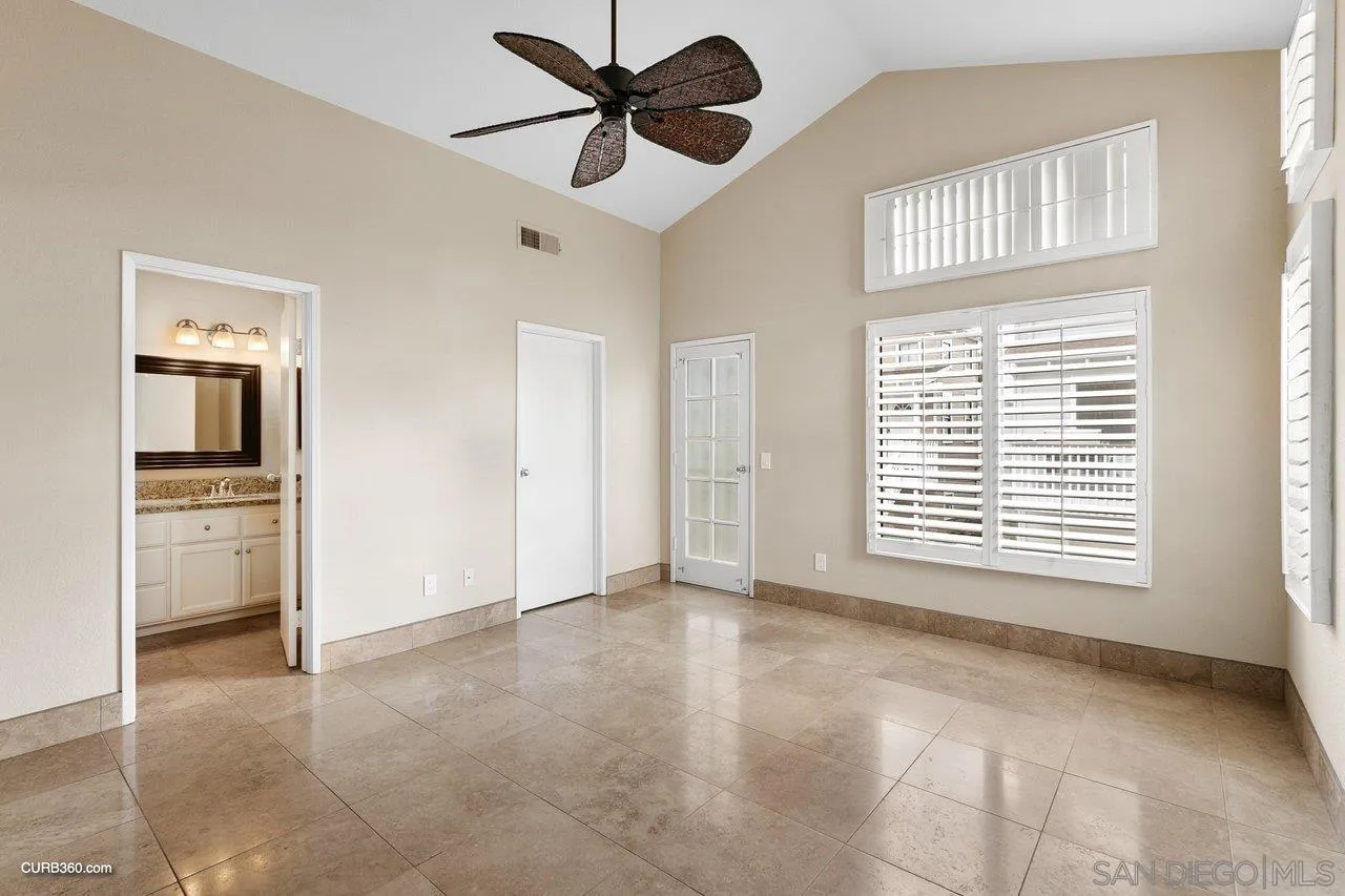 4579 54th Street San Diego, CA 92115 - Photo 21 of 39 a view of an empty room with a window