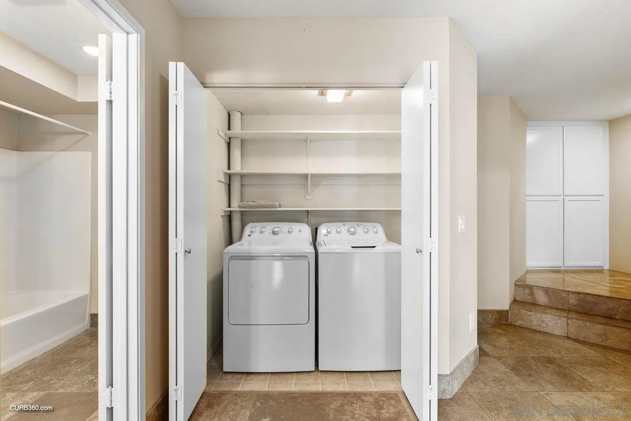 4579 54th Street San Diego, CA 92115 - Photo 35 of 39 a view of a utility room with washer and dryer
