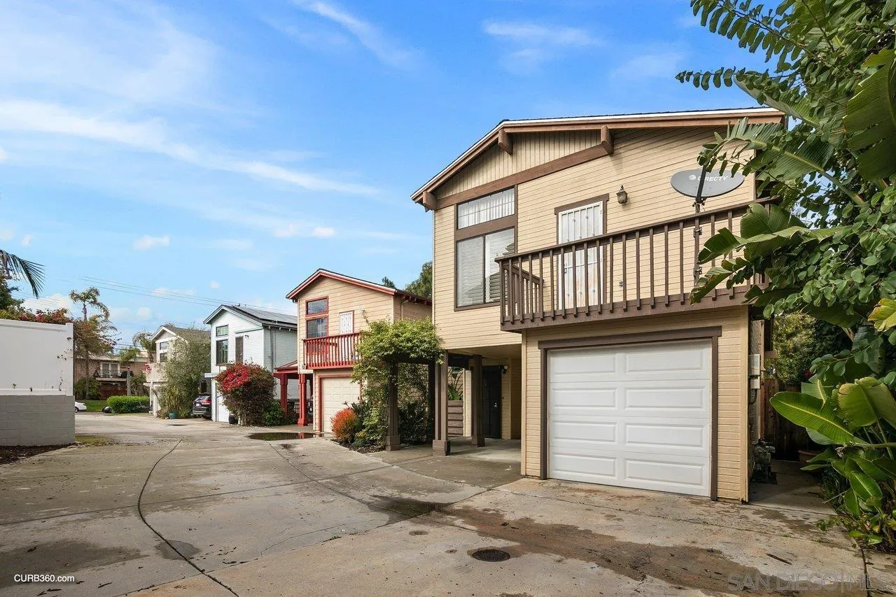 4579 54th Street San Diego, CA 92115 - Photo 39 of 39 a front view of a house with a yard