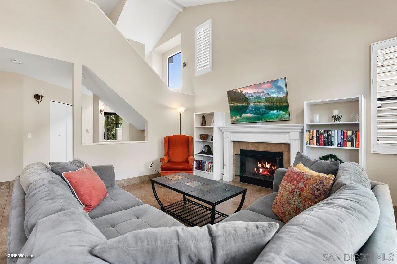 4579 54th Street San Diego, CA 92115 - Photo 4 of 39 a living room with furniture and a fireplace