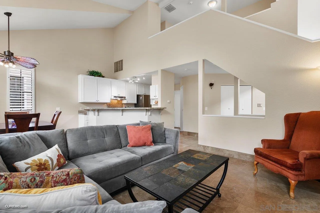 4579 54th Street San Diego, CA 92115 - Photo 5 of 39 a living room with furniture and a wooden floor